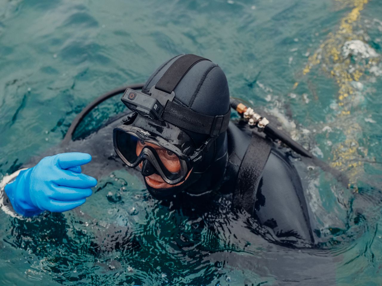 Commercial diver surfacing after an inspection dive